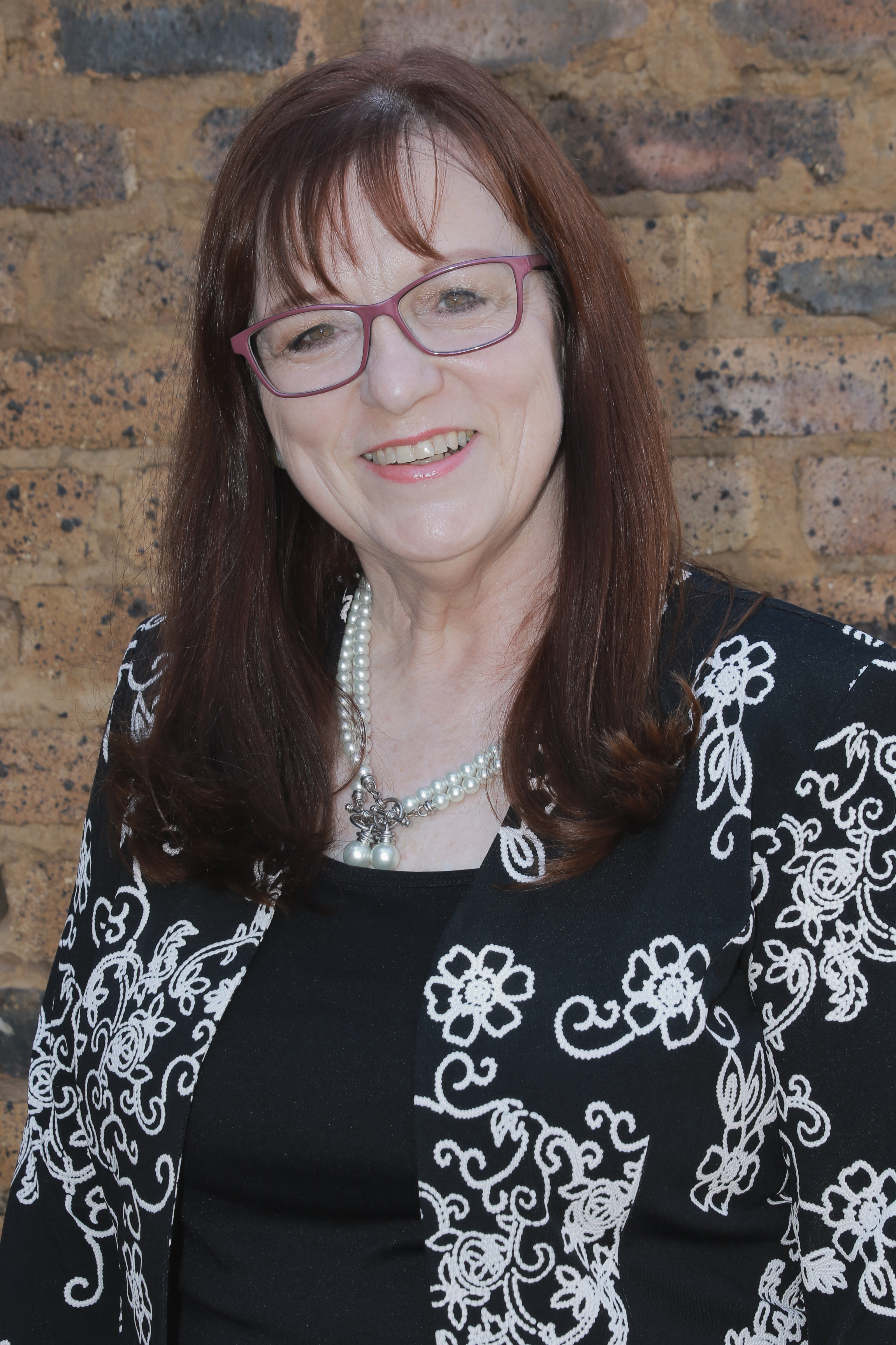 Mrs Charmain Botha